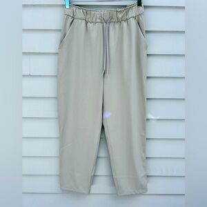 Lululemon - Drawstring Pant, Crop in Tan. Never worn. Size 8.
